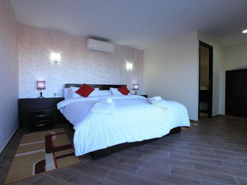Un pat sau paturi într-o cameră la Dakhla Kitesurf World