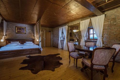 Postel nebo postele na pokoji v ubytování Chateau Krakovany