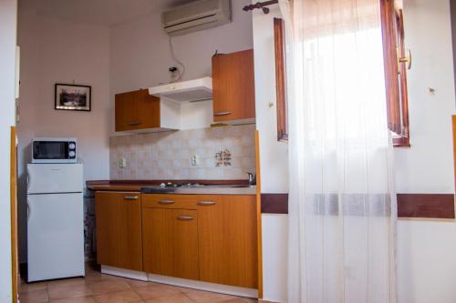 Una cocina o zona de cocina en Apartments Venema