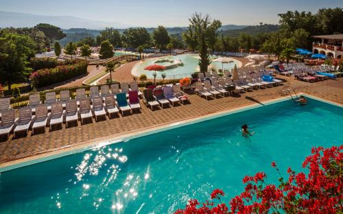 A view of the pool at Villa Norcenni ApartHotel or nearby