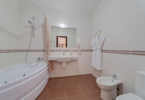 Un baño de Agni Club Hotel