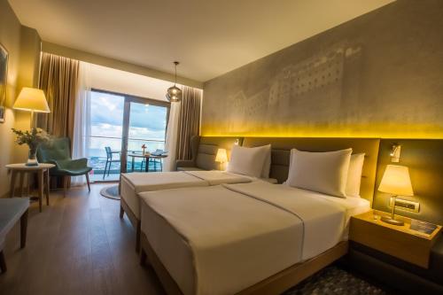 Ένα ή περισσότερα κρεβάτια σε δωμάτιο στο Radisson Blu Hotel Trabzon
