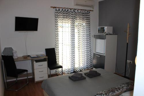 Photo de la galerie de l'établissement Apartments & Rooms Tea, à Zadar
