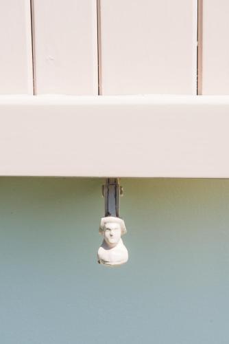 a bathroom light hanging from a white counter top at Exclusive beautiful pool house surrounded by greenery, modern, luxury finishes in Camaiore