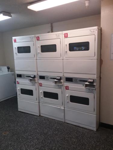 four ovens stacked on top of each other in a room at InTown Suites Extended Stay Nashville TN - Murfreesboro Pike in Antioch