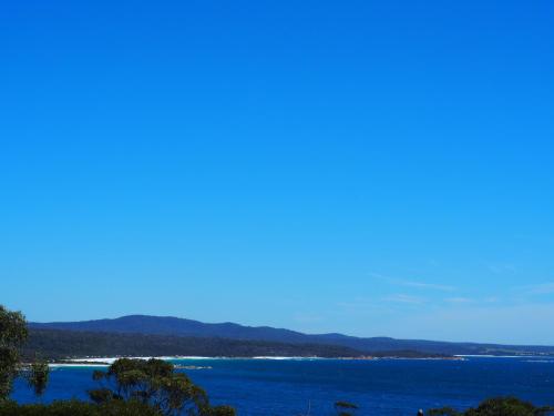 a view of a large body of water at GRANITE BEACH HOUSE @ Bay of Fires in Binalong Bay
