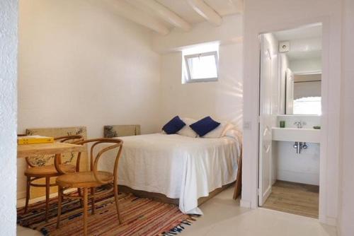 En eller flere senge i et værelse på Apartamento Palau Cadaques