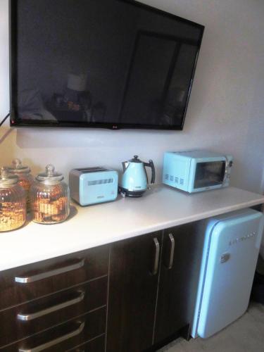 Una cocina o zona de cocina en Maples on Harewood