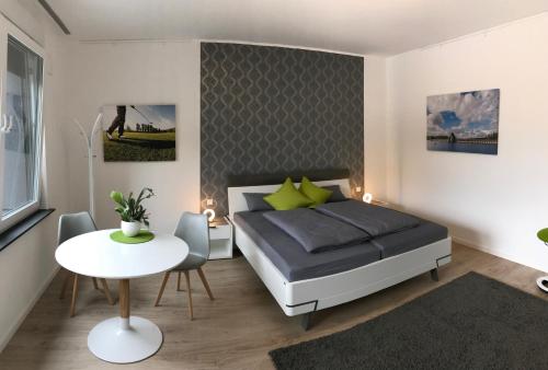 Postel nebo postele na pokoji v ubytování Auszeit am See