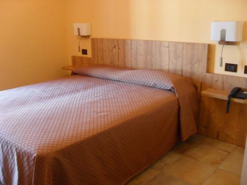 Katil atau katil-katil dalam bilik di Ristorante Albergo Da Maurizio