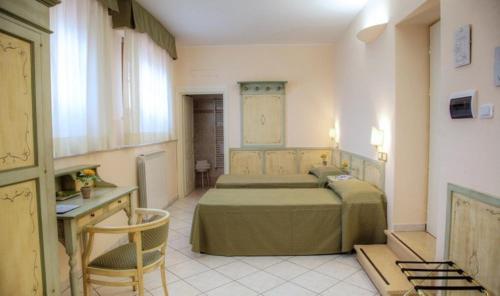 En eller flere senger på et rom på Villa Santa Margherita - B&B