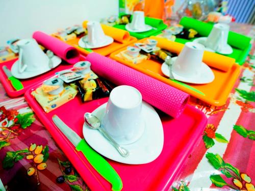 a group of plastic trays with hats on them at Barone Bed and Breakfast in Salerno