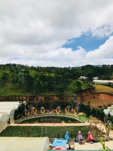 a large amphitheater with a crowd of people in it at Berry Valley Homestay in Da Lat