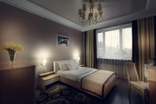 Posteľ alebo postele v izbe v ubytovaní Hotel Park Avenue
