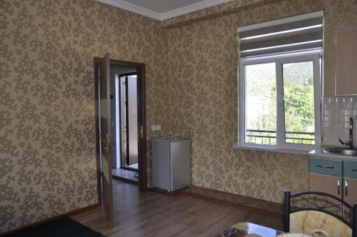Kuchyň nebo kuchyňský kout v ubytování Apartments Firuze
