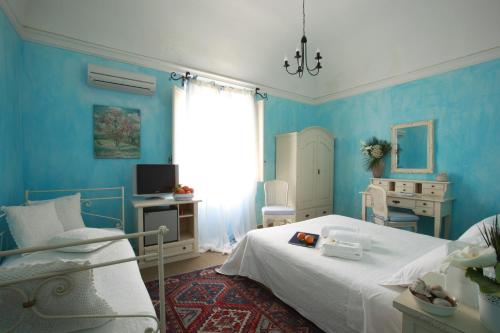 Postel nebo postele na pokoji v ubytování Albergo Egadi