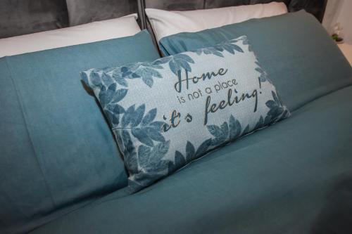 a pillow on a bed with a pillow saying there is not a error it is at Artist Terrace Apartments in Mellieħa