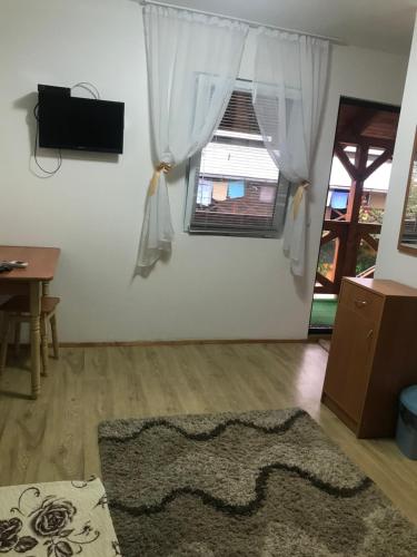 Μια τηλεόραση ή/και κέντρο ψυχαγωγίας στο Мотель Ріта