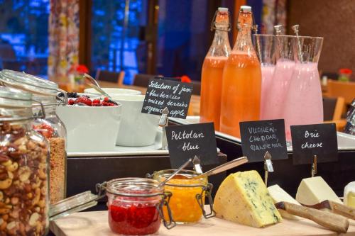 a buffet with different types of food and drinks at Hotel Hanasaari in Espoo