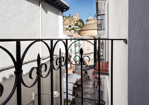 a balcony with a view of a city at Nuevo Monteftur in Montefrío