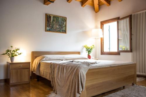 מיטה או מיטות בחדר ב-Casetta Carmine
