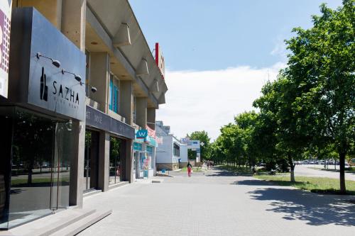 an empty street in front of a building at Apart-Hotel "LAVINA" in Sumy