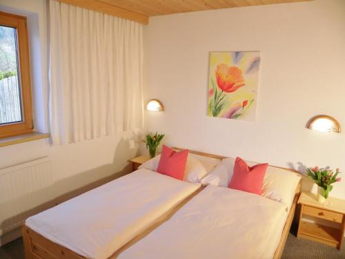 Кровать или кровати в номере Apartment Landhaus Krall