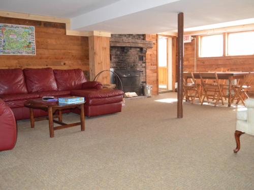 a living room with a couch and a table at Wiley Inn in Peru