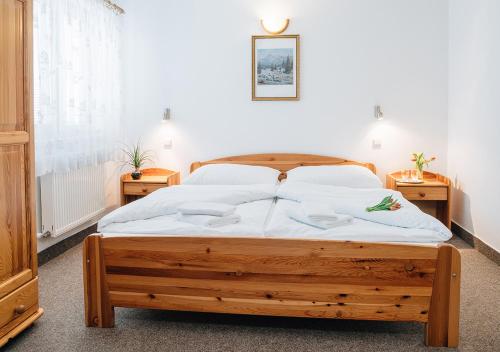 Postel nebo postele na pokoji v ubytování Penzion Jordan