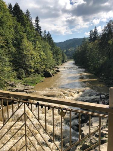 a view of a river from a bridge at Girske Povitria 2 in Yaremche