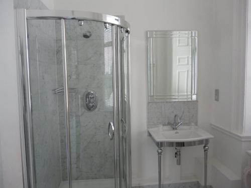 a bathroom with a shower and a sink at Aston Hall Hotel, BW Signature Collection in Sheffield