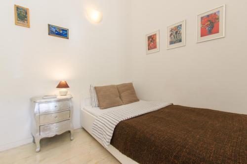Posteľ alebo postele v izbe v ubytovaní Rental Apartments Poznańska