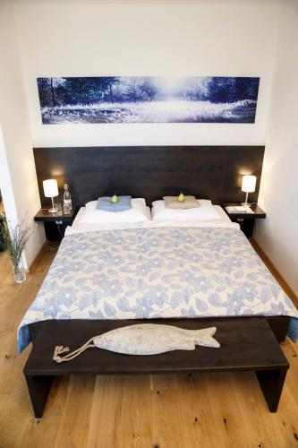 מיטה או מיטות בחדר ב-Fairway-Appartements