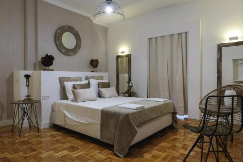 Ένα ή περισσότερα κρεβάτια σε δωμάτιο στο 4U Lisbon Airport Suites