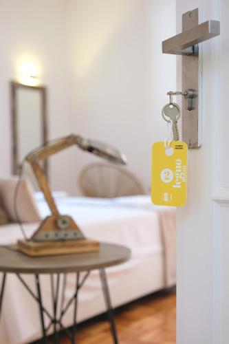 Ένα ή περισσότερα κρεβάτια σε δωμάτιο στο 4U Lisbon Airport Suites