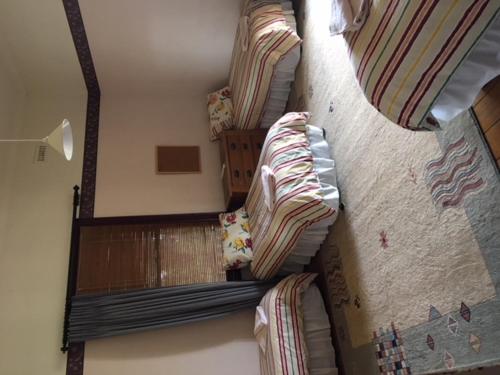 a stairway in a room with at Holmhurst Guest House in Bathurst
