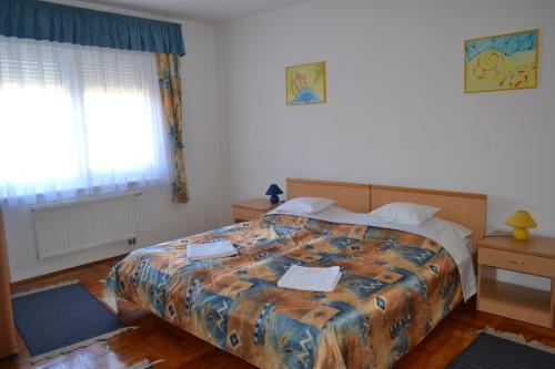 Кровать или кровати в номере Leier Business Hotel