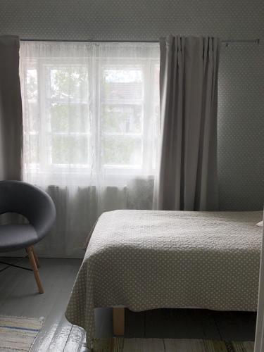Postel nebo postele na pokoji v ubytování Hotel Palo