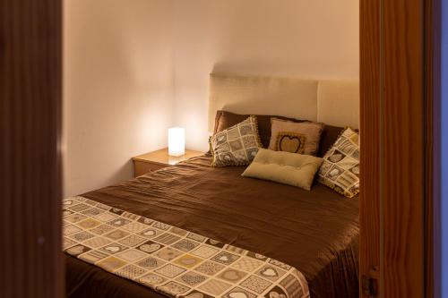 Кровать или кровати в номере Apartamento a pie de playa