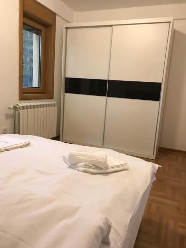 Cama o camas de una habitación en Zlatibor apartmani Jakovljevic