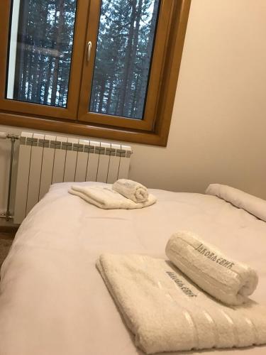 Cama o camas de una habitación en Zlatibor apartmani Jakovljevic