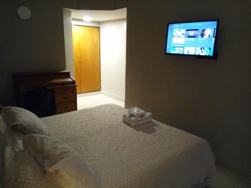 Cama o camas de una habitación en Apart Hotel Comra