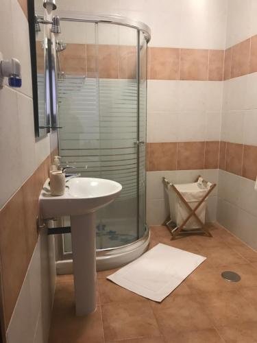 Koupelna v ubytování Apartamentai