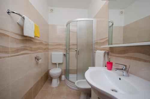 Koupelna v ubytování Apartments Miljenko