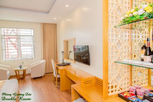 Μια τηλεόραση ή/και κέντρο ψυχαγωγίας στο Palm Hotel Thanh Hoa