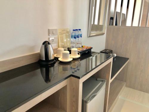 Cucina o angolo cottura di Methavalai Residence Hotel - SHA Extra Plus
