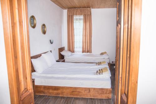 Giường trong phòng chung tại Villa Zaburdo