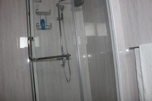 Ванна кімната в TAMA'S HOLIDAY APARTMENT