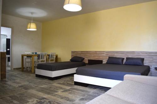 Postel nebo postele na pokoji v ubytování La Suite Negli Orti