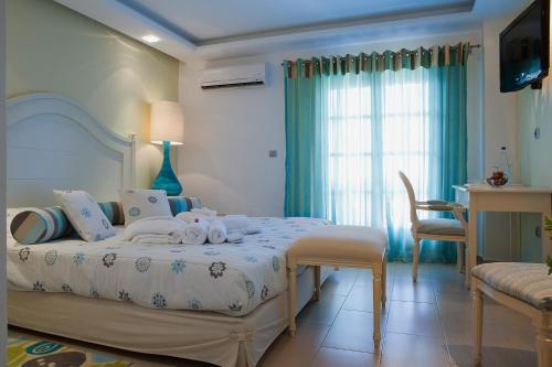 Postel nebo postele na pokoji v ubytování Magic Hotel